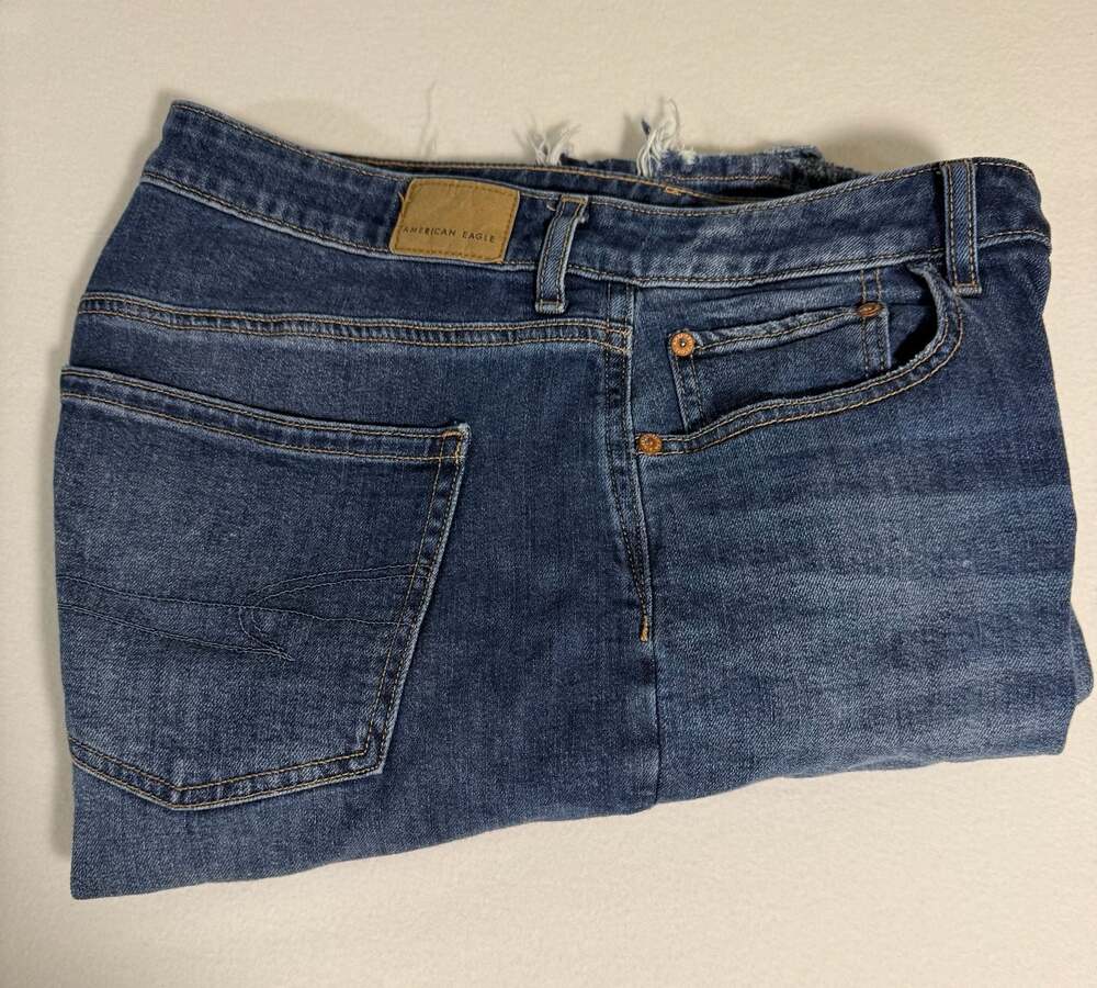 American Eagle Low-Rise Baggy Wide Leg Raw Hem Jeans